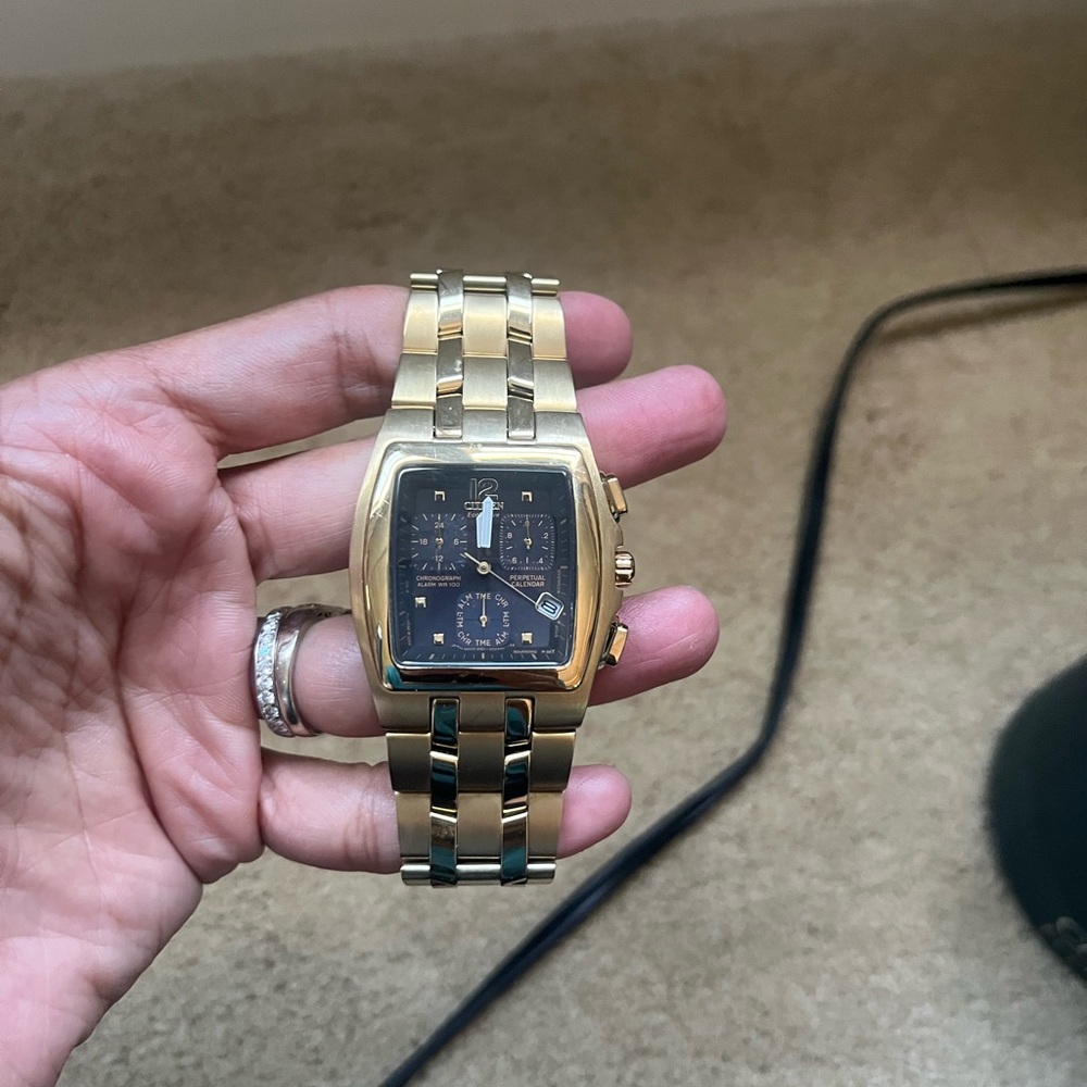 Men’s gold citizen ecodrive watch